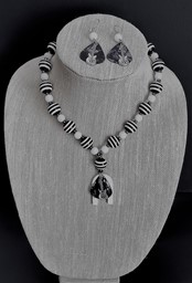 Picture of Black and White Stripe Acoustic Guitar Pick Necklace